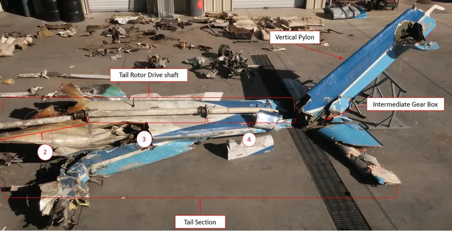 Recovered tail section with tail rotor drive shaft segments annotated