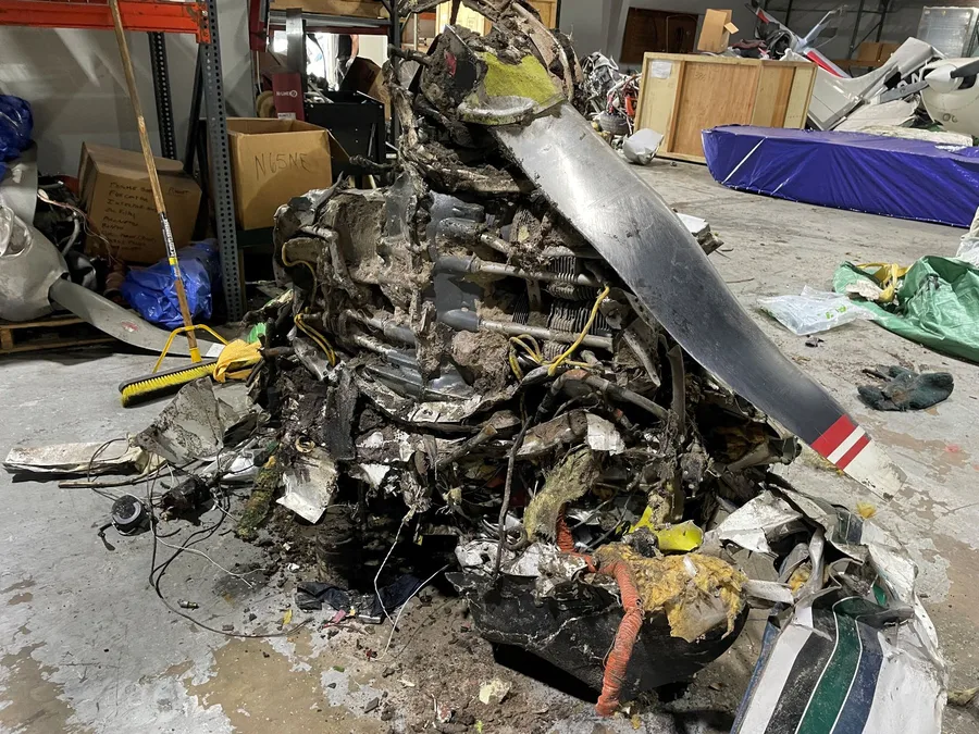 Recovered engine and propeller assembly at the recovery facility